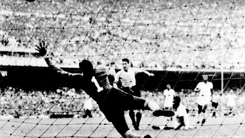Uruguayan forward Juan Alberto Schiaffino (C) kicks the ball past Brazilian goalkeeper Moacyr Barbosa to tie the score at 1 during the World Cup final round soccer match between Uruguay and Brazil 16 July 1950 in Rio de Janeiro. Uruguay upset Brazil 2-1 to win its second World title after winning the first World Cup in 1930 in Uruguay. AFP PHOTO (Photo credit should read STAFF/AFP/Getty Images)